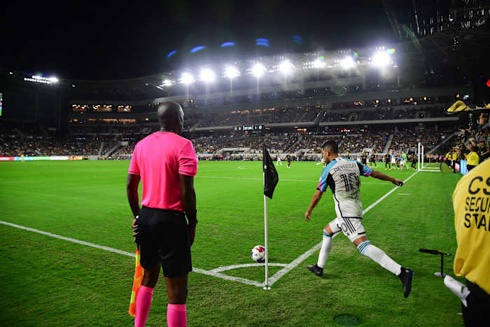 Oct 4, 2023; Los Angeles, California, USA; Minnesota United midfielder Emanuel Reynoso (10) takes a corner kick against Los Angeles FC during the first half at BMO Stadium.